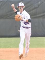 Gilmer High second baseman Haden West throws to first for an out. He made a pair of relief appearances last week  and was the winning pitcher in game three versus Lumpkin County. 