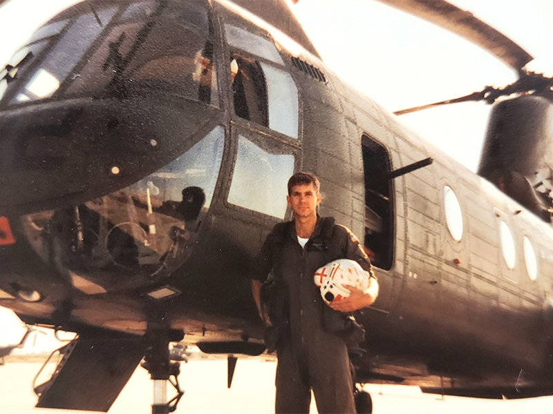 Marine First Lt. Brian Groenhout with a CH-46 “Sea Knight” helicopter. (Contributed photos)