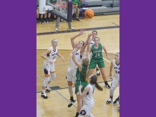 GHS senior Elly Callihan goes up for a rebound versus Pickens last Saturday. She finished the game with 22 points, 11 rebounds and four steals.