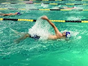 Gilmer High’s Kaden Little swims the backstroke as part of the Bobcats’ 200-yard medley relay team, who placed 10th last Saturday.