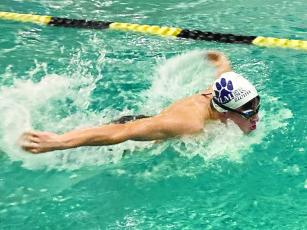 Gilmer High’s Jacob Kucera swims the butterfly in the 200-yard medley relay last Thursday in Calhoun.