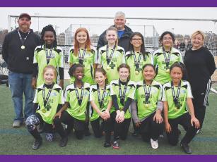 Above are TRAC’s 12U Fusion soccer players and coaches. They won their league and two tournaments during the fall season while posting a 16-0-1 record. Front row from left, are Lily Teague, Anez Perigo, Lilha Mullen, Autumn Little, Brianna Vega and Alie Morin. Back row are assistant Joe Marshall, Tiroyaone Kwapa, Emilee Defoor, Joei Marshall, head coach Stephen Byrd, Jazmin Landaverde, Lizbeth Martinez and assistant Brigitte Perigo.