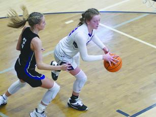 Gilmer’s Brooke Wilson led GHS with 11 points against East Forsyth last Friday and was the Cats’ top rebounder versus Dawson County with six.