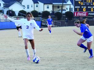 Gilmer Lady Cat Reagan Boling lines up a shot versus Trion last Friday.