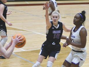 Senior Lark Reece defends the perimeter versus Cherokee Bluff last Tuesday and led Gilmer with 13 points.