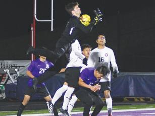 Freshman Bobcat goalkeeper Talyn Curtis skies to make his final save versus Dalton Academy last Friday.