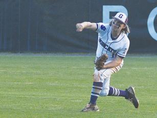 Gilmer right fielder Billy Goswick relays the ball to the infield, and he was one of seven seniors to play his final baseball game for the Bobcats last Friday.
