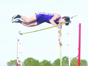 Gilmer High’s Will Kiker set a new school record in the pole vault at last Saturday’s sectional meet when he cleared 14’. He is a third-generation record holder in the event at GHS.