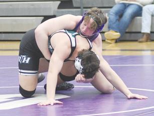 Gilmer High School’s Owen Moss gains control of his opponent during his senior season and will attend Emmanuel College to wrestle for the Lions.