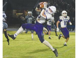 Gilmer High alum Dominic Tarantino intercepts a pass last fall versus White County. He is set to enroll at The Citadel and will play football for the Bulldogs.