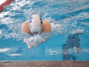 Gilmer High’s Esther Bowman swims the breaststroke at last Saturday’s Battle of Dalton.