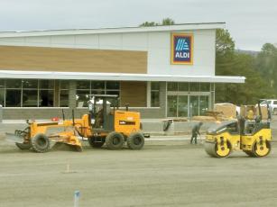 Construction of an Aldi supermarket in East Ellijay nears completion, but the opening of the store could be delayed due to the long wait time for a power transformer. 