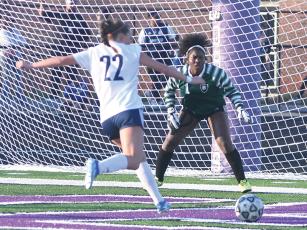 Gilmer High goalkeeper Amayah Jones prepares to thwart a White County Warriors’ shot from a dangerous position last Friday. 