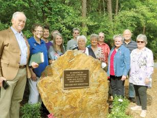 Taking part in last Friday’s dedication of the Rose Cemetery were, left to right, the Rev. Steve Fields, Jennifer Anderson, Jane Tischler, Susan Noles, Jean Tolbert (hidden), Erin Brandy, Danette Ozment, Judy Price, Lydia Bassetti, Barbara Murray, Rodney Anderson and Faye Cawthon. Many are members of the National Society of the Daughters of the American Revolution (Capt. James Kell Chapter), and others are with the Gilmer County Genealogical Society.
