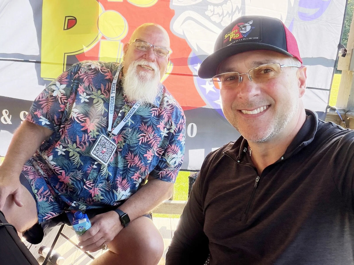 From left are John Davis and Dave Garner on location for The Morning Rant broadcast on 93.7 The Sports Pig.