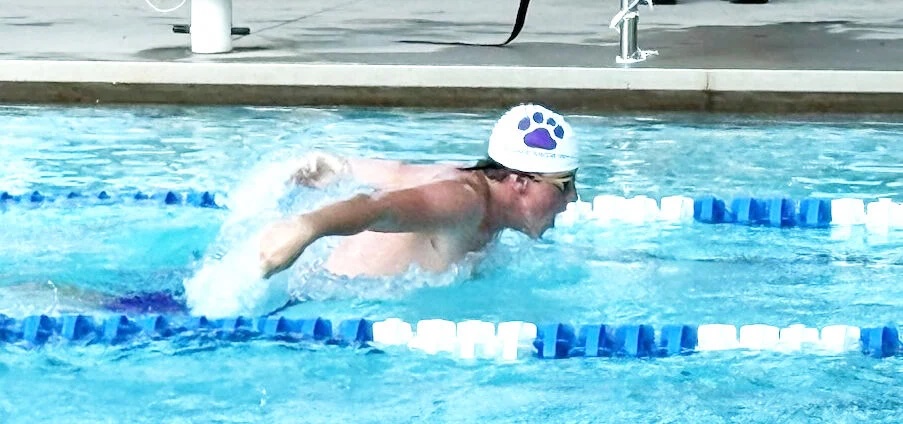 Bobcat Ryder Johnstone swims the butterfly. 