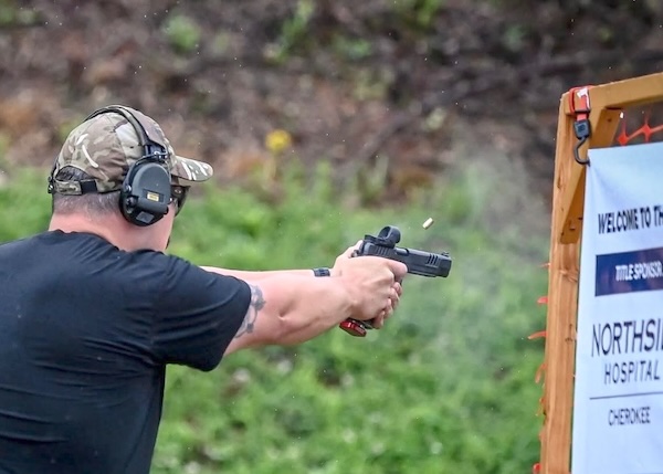 Gilmer County Sheriff's Office Deputy Sheriff Jake Knight focuses on a target during a stage of shooting at the June 2026 Georgia Police and Fire Games.