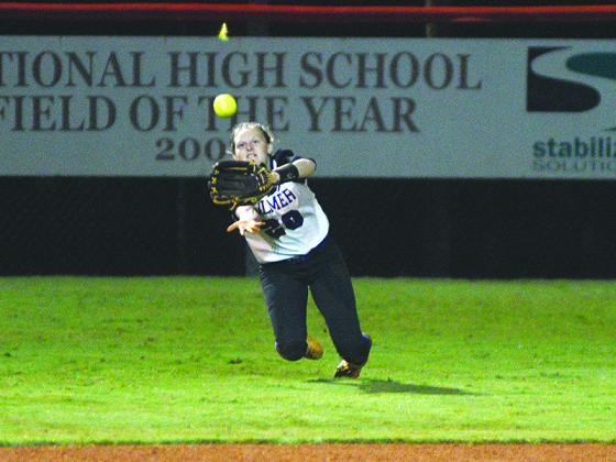 Gilmer left fielder Jacie Bennett makes a diving catch during game two of last Tuesday’s doubleheader against Madison County.