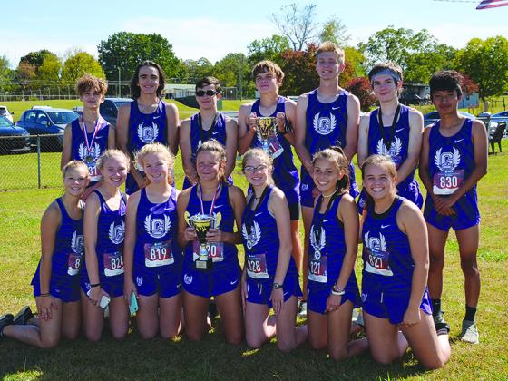 The Gilmer High Bobcats and Lady Cats both finished second at last week’s Region 6-4A Cross-Country Championships. Back row, from left are Bobcats Dylan Byrd, Carson Purvis, Austin Long, Jon Nix, Nate Mooney, Jakob Dobbs and Ricky Ambrosio-Perez. Front row, are Lady Cats Laney Hensley, Mallory Henson, Anna Byrd, Naomi Coombs, Madison Stanley, Helana Garland and Ashley Spagnola. The Bobcats and Lady Cats will make their way to Carrollton Friday for the Class 4A state meet.