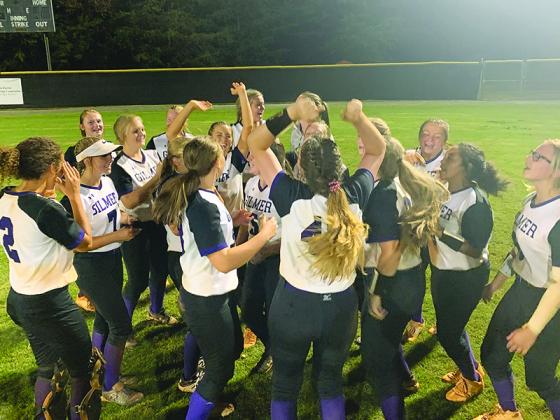 Gilmer High School softball players gather to celebrate their berth into the Class 4A state tournament after defeating Pickens last Monday. It will be the Lady Cats’ first trip to state since the 2015 season.