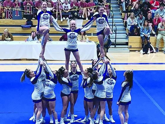 Gilmer High cheerleaders perform their routine at last Saturday’s competition at South Forsyth High School.