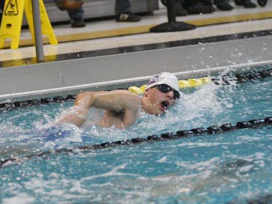 Bobcat Connor Richards (above) and Lady Cat Cadence Mohon (below) swim at Calhoun last Thursday. Richards cut his 50-yard freestyle time from 36.37 to 33.83 while Mohon helped Lady Cat relay teams secure top three placements.