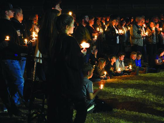 Gilmer students and community members showed up at a candlelight vigil held at River Park Sunday night to support Luke Crump, who was injured in an accident Nov. 12.