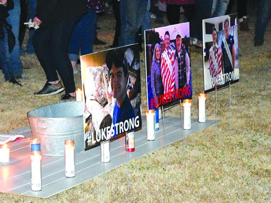 Gilmer students and community members showed up at a candlelight vigil held at River Park Sunday night to support Luke Crump, who was injured in an accident Nov. 12.