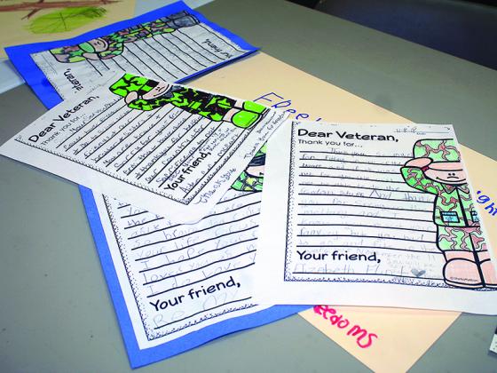 On display at last year’s Veterans Day lunch at the Ellijay Lions Club were several examples of the various writing and art projects done by students in local schools to honor local military men and women each year.