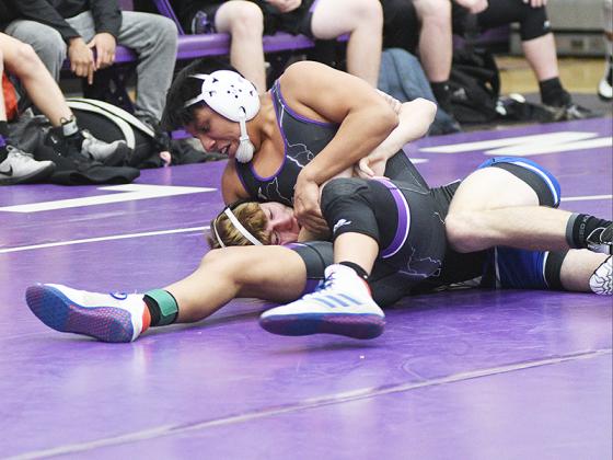 Gilmer’s Diego Jacinto is moments away from pinning his Fannin County opponent last Wednesday to help the Bobcats claim first place at the Highway 515 Classic.