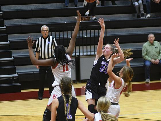 Bailey Teague (22) fires a shot in the lane against Baylor, Tenn., in the first round of the Carpet Capital Christmas Classic last Friday.