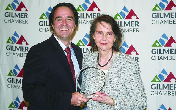 Merle Howell Naylor, right, holds the Gilmer Chamber’s Citizen of the Year Award for 2019 alongside 2018 COTY Steve Purvis.