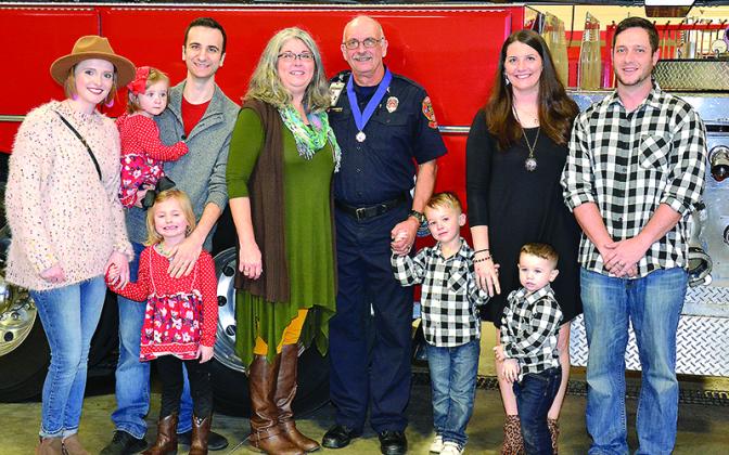Sales is pictured with family at the reception. From left: daughter-in-law Hannah Sales, granddaughters Lakelyn and Hayden, son Matthew, wife Vera, Sales, grandsons Kollin and Kellen Parks, daughter Brittany Parks and son-in-law Troy Parks. 