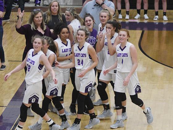 Above are Gilmer High basketball players and coaches following the Lady Cats’ state tournament clinching victory last Tuesday.