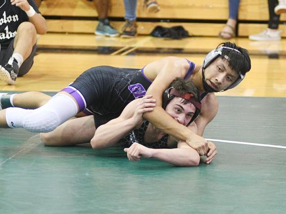 120-pound region champion Lucas Lopez