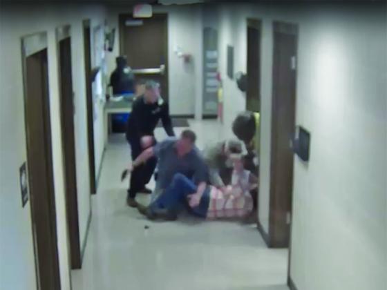 Security video footage shows the moment when a firearm was wrestled from the grip of the attacker who came in with intent of murder-suicide.