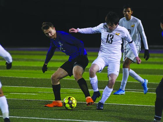 Gilmer’s Tyler Jack (center) jostles for position against North Murray last Wednesday. He scored a goal two days later versus Lakeview-Fort Oglethorpe.