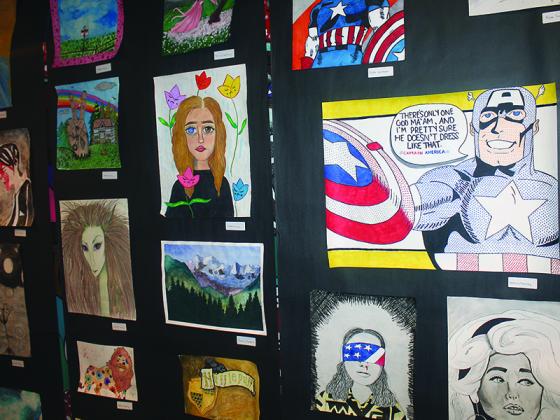 Some of the artwork by Gilmer High School students now on display in a Youth Art Month exhibit at the Gilmer Arts Gallery.