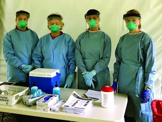 Health department nurses at the Gilmer County Specimen Point of Collection (SPOC) site. From left to right are Jennifer Vick, Leeann Dover, Krystal Sumner and Raquel Watkins.