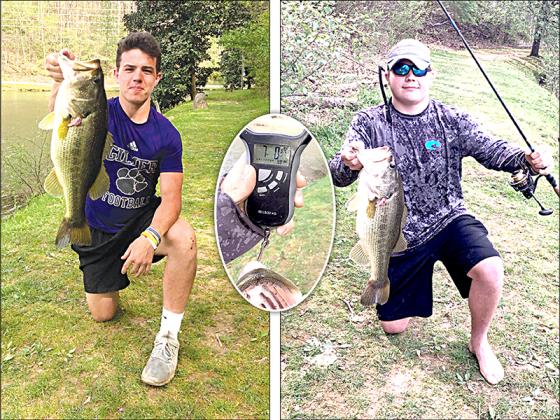 GHS football players Spenser Smith (senior), left, and Patrick Danforth (sophomore) caught this 7-pound bass in the fish pond at Coosawattee River Resort. They both worked three days to land the big fish.