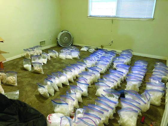 Some of the 136 kilograms of methamphetamine valued at $1.76 million and approximately $100,000 seized during the investigation which resulted in drug and gang charges and arrests.
