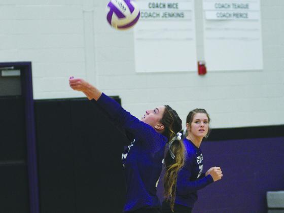 Gilmer senior setter Beth Burnette keeps a rally alive and had 12 assists and eight digs in the Cats’ win versus Fannin County.