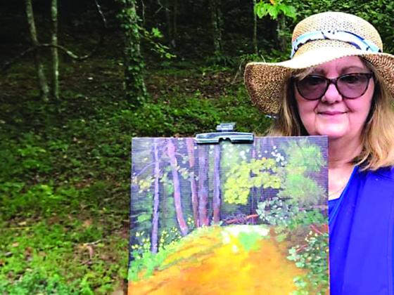 Jan Dappen shows a “quick draw” painting she made the recent Plein Air: Art in the Mountains event.