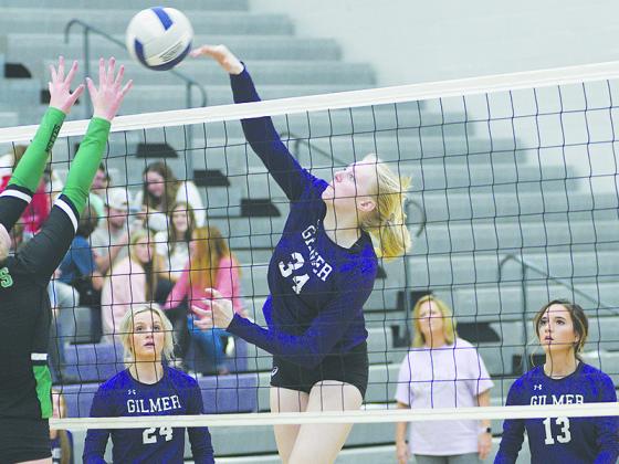 Lady Cat Taylor McCormick (34) had seven kills for Gilmer High last week.