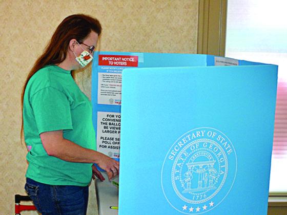 Tracy Jones was one of many casting votes at the Gilmer County Courthouse during early voting Tuesday, Oct. 27.