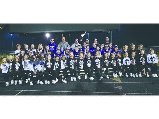 Pictured are Gilmer’s 11-under football players and cheerleaders with their coaches following the Bobcats’ 53-27 championship victory over Chestatee.