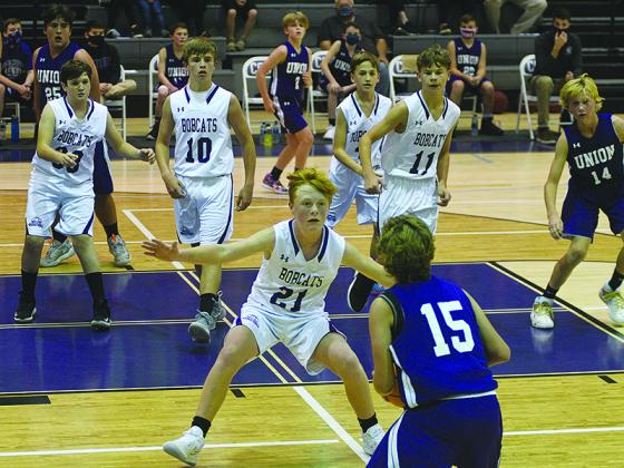 Clear Creek’s seventh-grade team deploys a zone defense versus Union County. Bubba Callihan (21) guards the perimeter and is backed up by teammates (from left) Peyton Chancey, Keegan Bryant, Chase Little and Boston Teague.