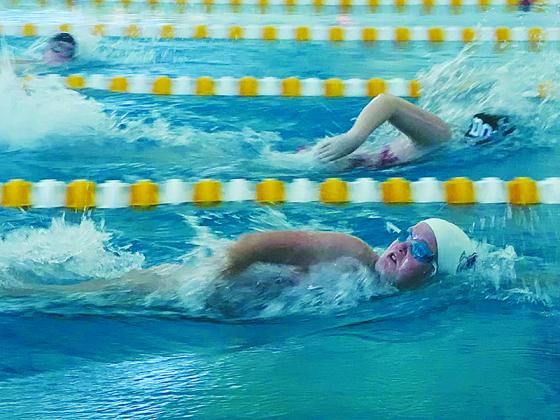 Anna Byrd swims a freestyle event for the Gilmer High Lady Cats last Friday.