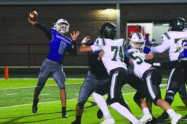 Gilmer quarterback Seth Darling launches the ball down field against North Hall last Friday. Darling completed five passes for 167 yards and a touchdown.