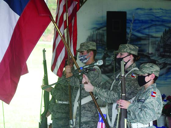 Members of the local Civil Air Patrol composite squadron perform their placement of colors.